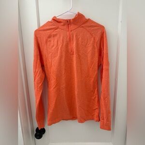 Figs salta quarter zip underscrub in “sunset orange”